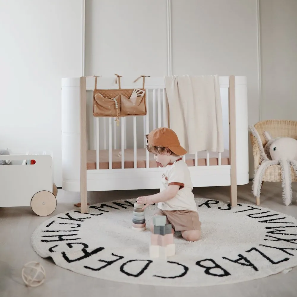 Mushie Crib Pocket Rainbows